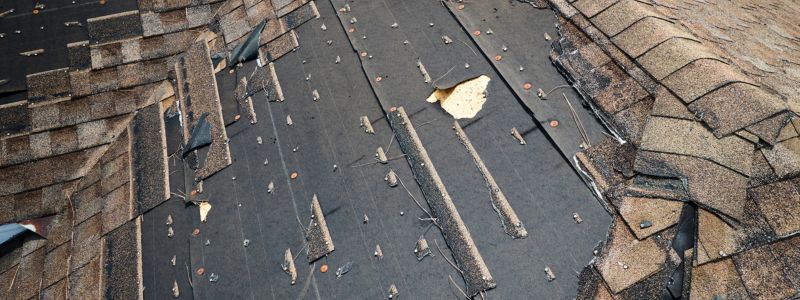 Widespread shingle damage Connecticut roof replacement